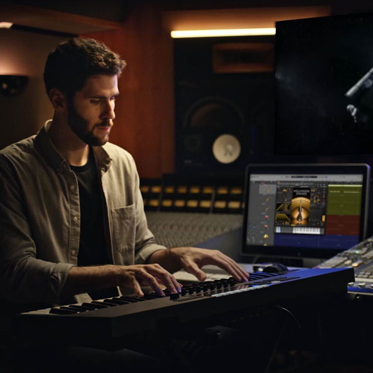 A composer scoring with EastWest Opus