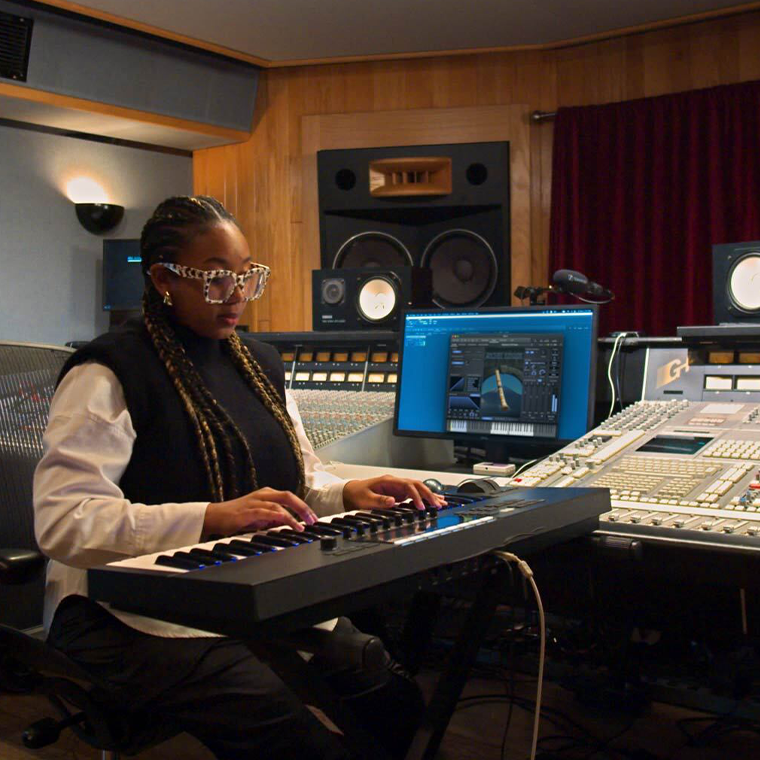 A songwriter producing with EastWest Opus